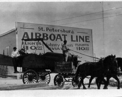 Horse-drawn carriage carrying aircraft parts from the Johnny Green Airboat Line Hangar, c. 1918.