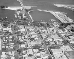 Aerial view of downtown & waterfront from 3rd St. N looking east along 3rd Ave. N, c. 1955. P00816