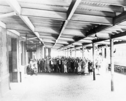A large crowd meets train No. 74 at the ACL depot on April 6, 1938.