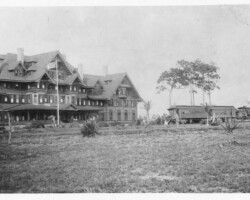 Arrival of the train to Henry Plant's Belleview Biltmore Hotel in Belleair. Note this is before hotel was painted white. c. 1897