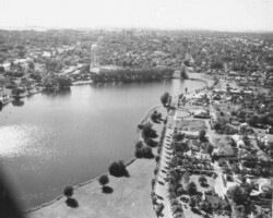 Aerial view of Crescent Lake with water tower in the background. c. 1940.