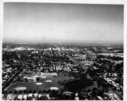 Aerial view of Bartlett Park and downtown. Bayboro Power Plant can be seen, right-center. c. 1960